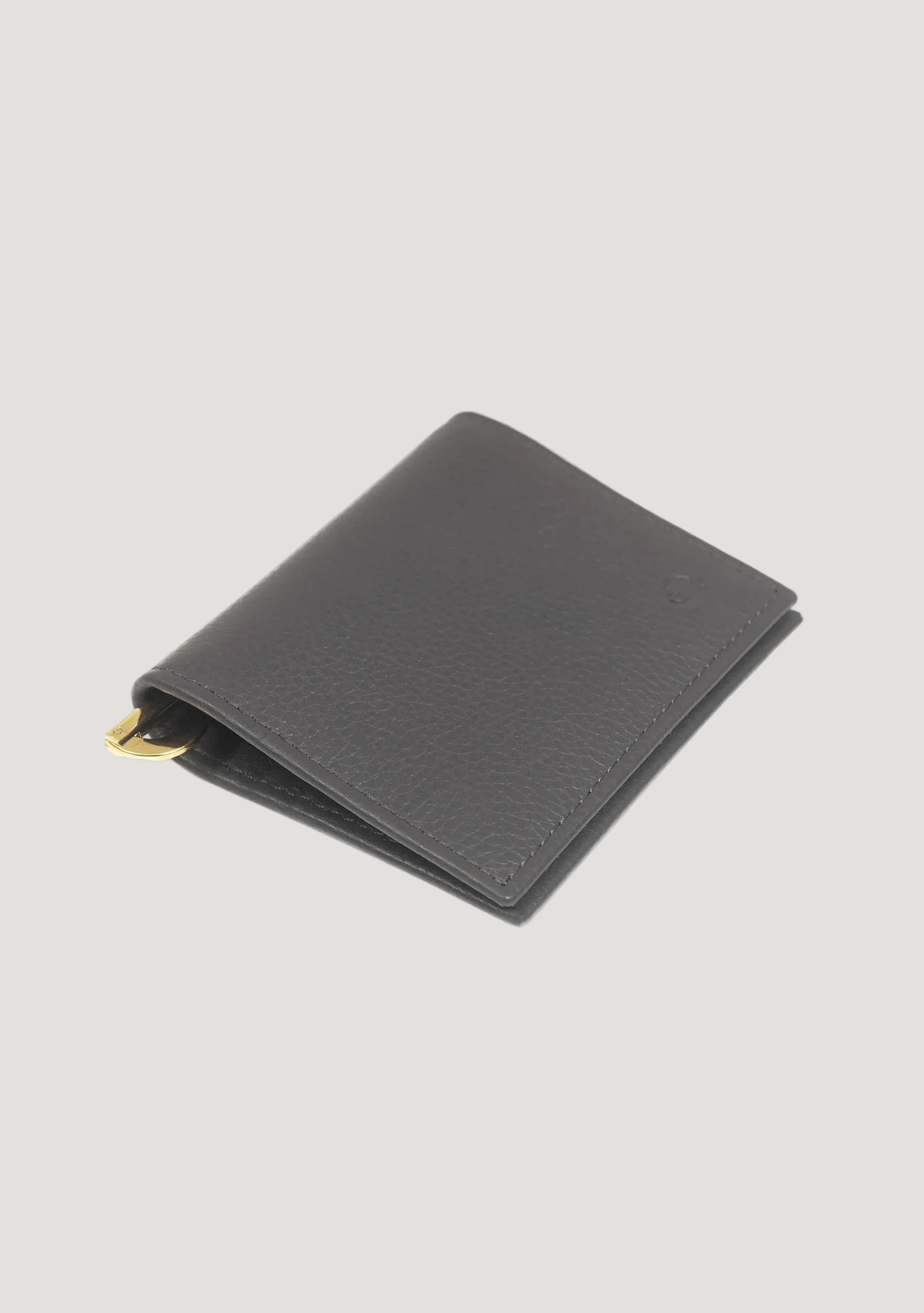 Slim leather money clip wallet for men in brown calfskin
Minimalist leather wallet with gold money clip
Luxury calfskin money clip wallet interior
Leather wallet with card slots and bill clip